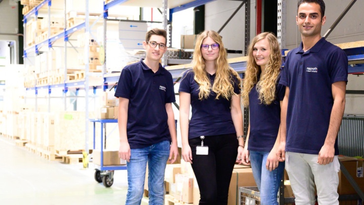 Four trainees from warehouse logistics