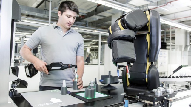APAS collaborative robot is working together with a human