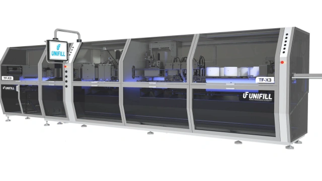Pionowa maszyna termoformująca TF-X3 firmy UNIFILL do napełniania jednorazowych opakowań produktami płynnymi i półstałymi, przeznaczona dla przemysłu spożywczego i niespożywczego