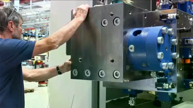 Employee working on a manifold