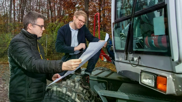 Matthias Kielbassa with colleague and off-highway vehicle