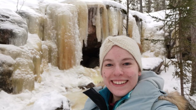 Leonie Ermert while in the Bosch Rexroth graduate program in front of rocky formations covered in snow and ice
