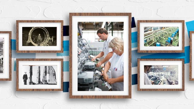 Photos of factories and manufacturing on a wall