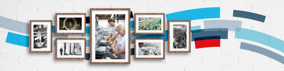Photos of factories and manufacturing on a wall