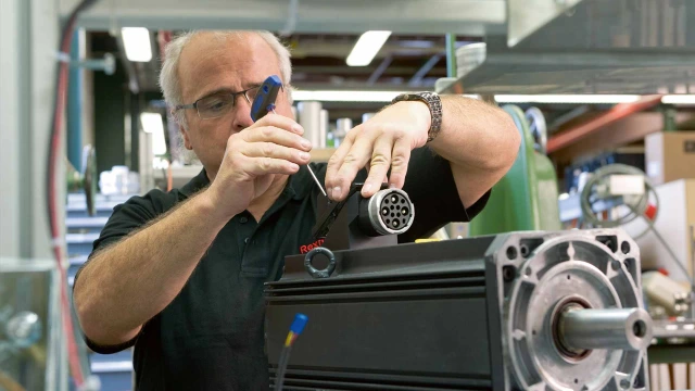 technician repairing machine
