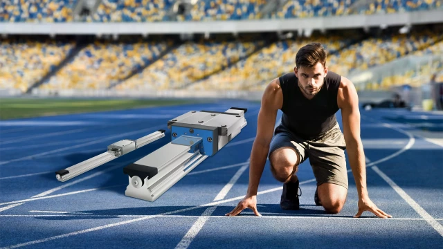 Symbolic image for maximum speed: A sprinter in starting position next to two high-speed runner blocks on a blue stadium running track.