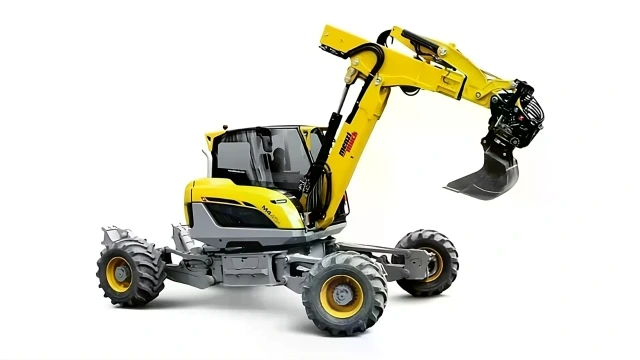 yellow-grey Menzi Muck M4x walking excavator against a white background