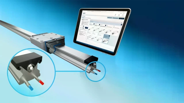 Roller rail system with integrated temperature control function: Close-up of the integrated pipes with red and blue ends, next to a tablet with online product selection.