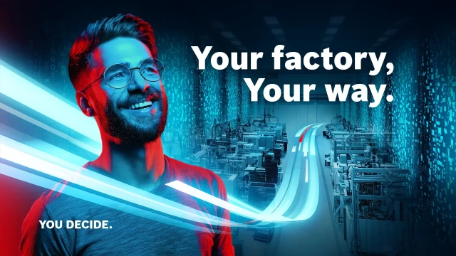Smiling man with factory background
