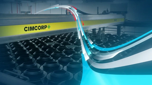 CIMCORP branded equipment: Handling materials in a warehouse setting.
