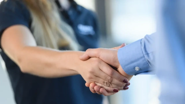 Handshake by two people.