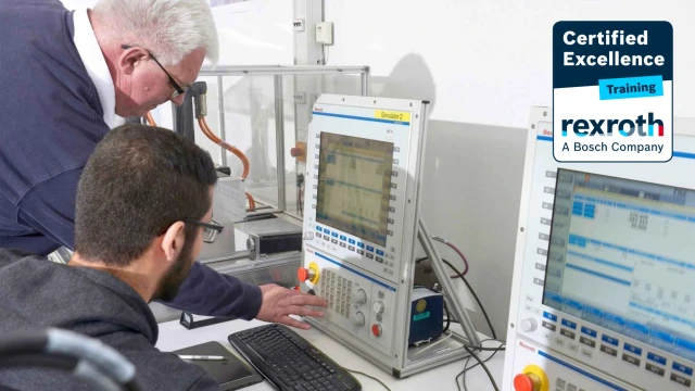 Training partner conducting technology training with Bosch Rexroth systems and teachware, aligned with Bosch Rexroth Academy standards