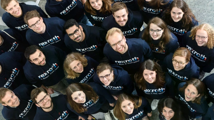 Bosch Rexroth employees looking into the sky