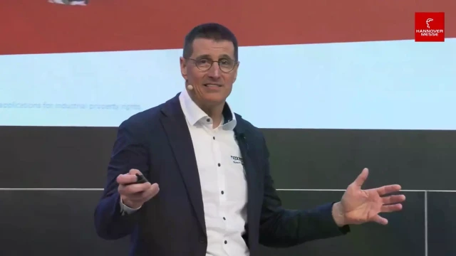 Thomas Fechner presenting during his keynote speech at the Hannover Messe 2025 trade fair