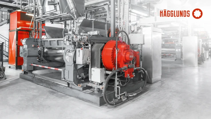 Black and white image of a machine with a red Hägglunds motor