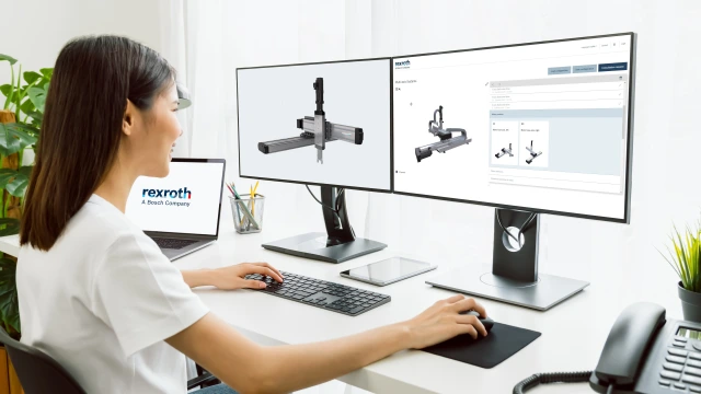 Women at her computer desk working 