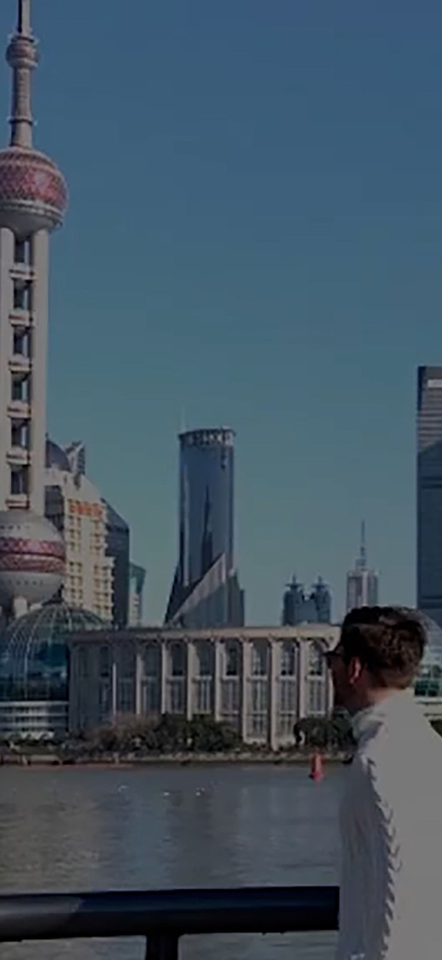 Man against Shanghai skyline