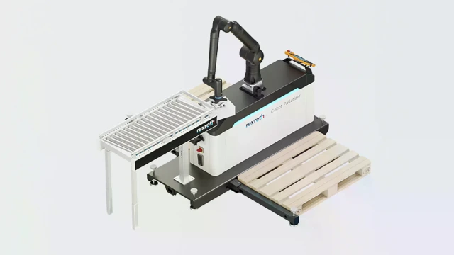 A Rexroth Cobot Palletizer system showing the collaborative robot, a roller conveyor, and an empty wooden pallet.