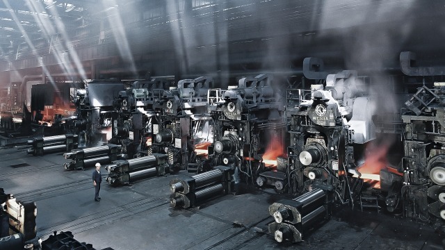 Hydraulic systems for rolling mills