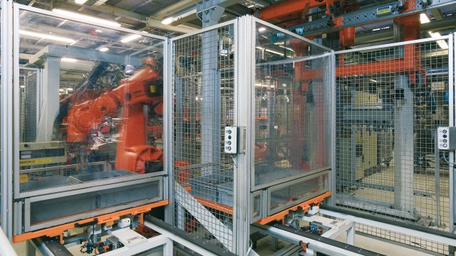 EcoSafe protective fence enclosure of a robot cell in automotive manufacturing