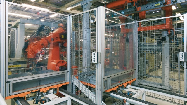 EcoSafe protective fence enclosure of a robot cell in automotive manufacturing