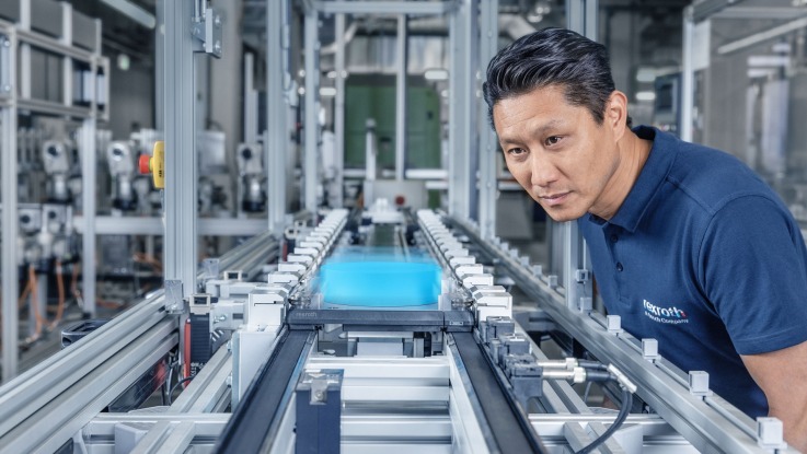 Man is looking at TS 2Booster transfer system