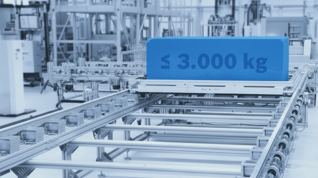Transfer system TS 7plus transports a blue module of up to 3,000 kg in an assembly hall