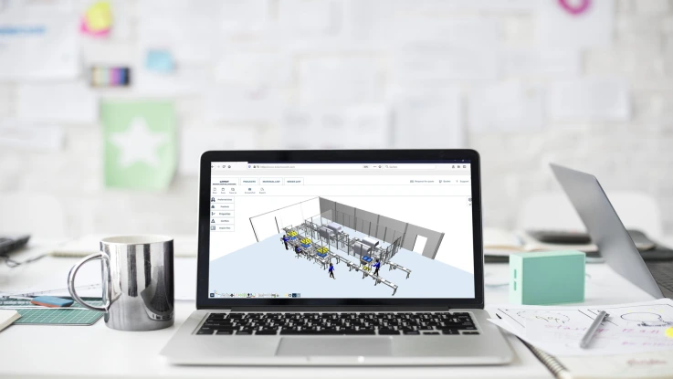 Open the laptop monitor in an office on which the MTpro Online Designer web configurator is visible