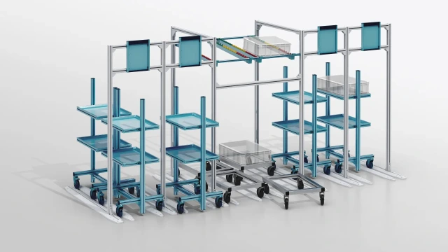 Material shuttles with blue crates on separate material levels, which are guided on rails. In addition, material shuttles with stacked blue crates.