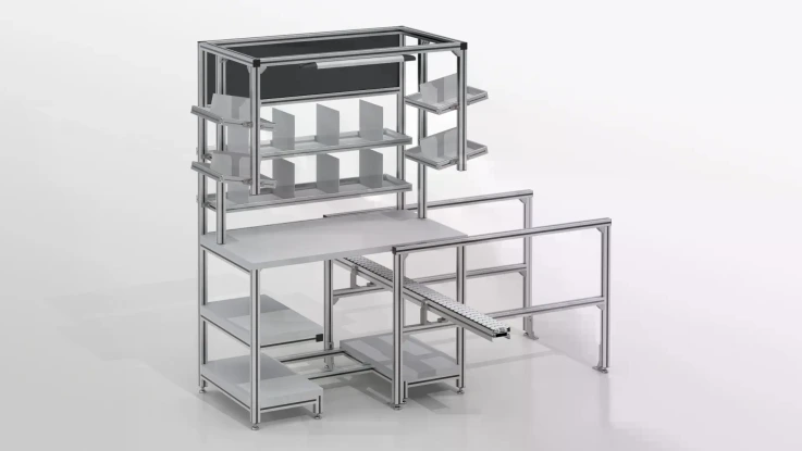 Modular shelving system with worktop, sloping compartments, roller rail for material supply, aluminum extension and mounted lighting.