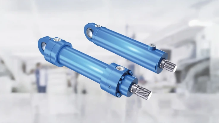 two blue hydraulic mill type cylinders