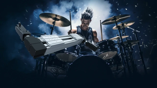 In the foreground you can see a compact module CKR-280 with two table parts, in the background a drummer.