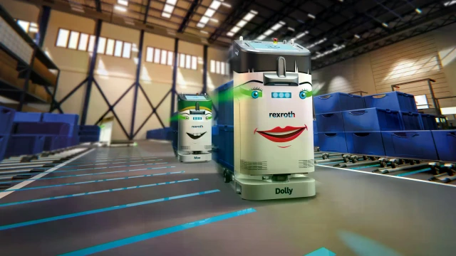 ACTIVE Shuttles with faces in a modern warehouse, moving blue containers