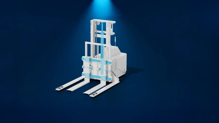 You can see the lifting unit of a forklift AGV with the turquoise-colored components of an electromechanical cylinder, linear guides and screw drives.