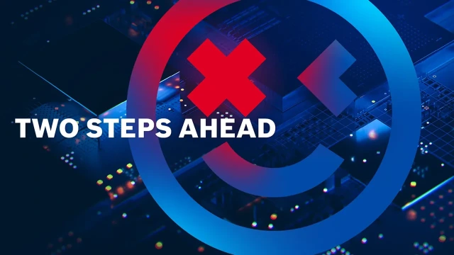 ctrlX AUTOMATIONのキャンペーンビジュアルを示す写真。キャンペーンカラーのグラデーションの中にピースマークが描かれており、「Two Steps Ahead（二歩先を進む）」というスローガンが添えられている。