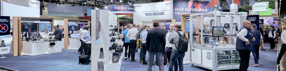 Bosch Rexroth booth with exhibits and visitor