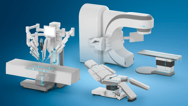 Operating table, a surgical robot and an oncology application in white on a blue background. The Rexroth components in the respective application are also shown in turquoise.