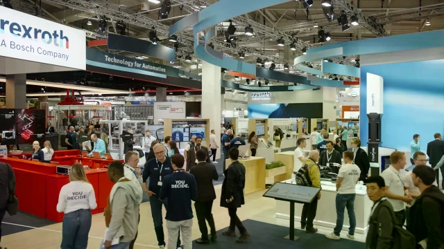 Bosch Rexroth booth with exhibits and visitor