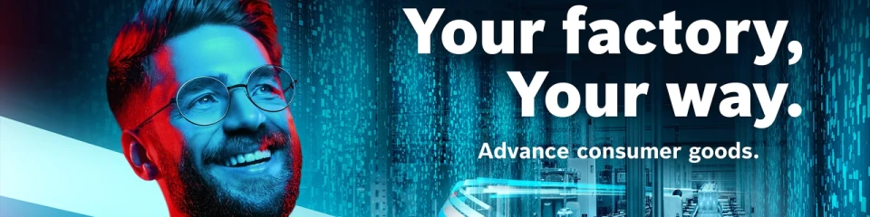 Άνδρας σε ένα σύγχρονο εργοστάσιο με κείμενο "Το εργοστάσιό σας, ο τρόπος σας. Προώθηση καταναλωτικών αγαθών.