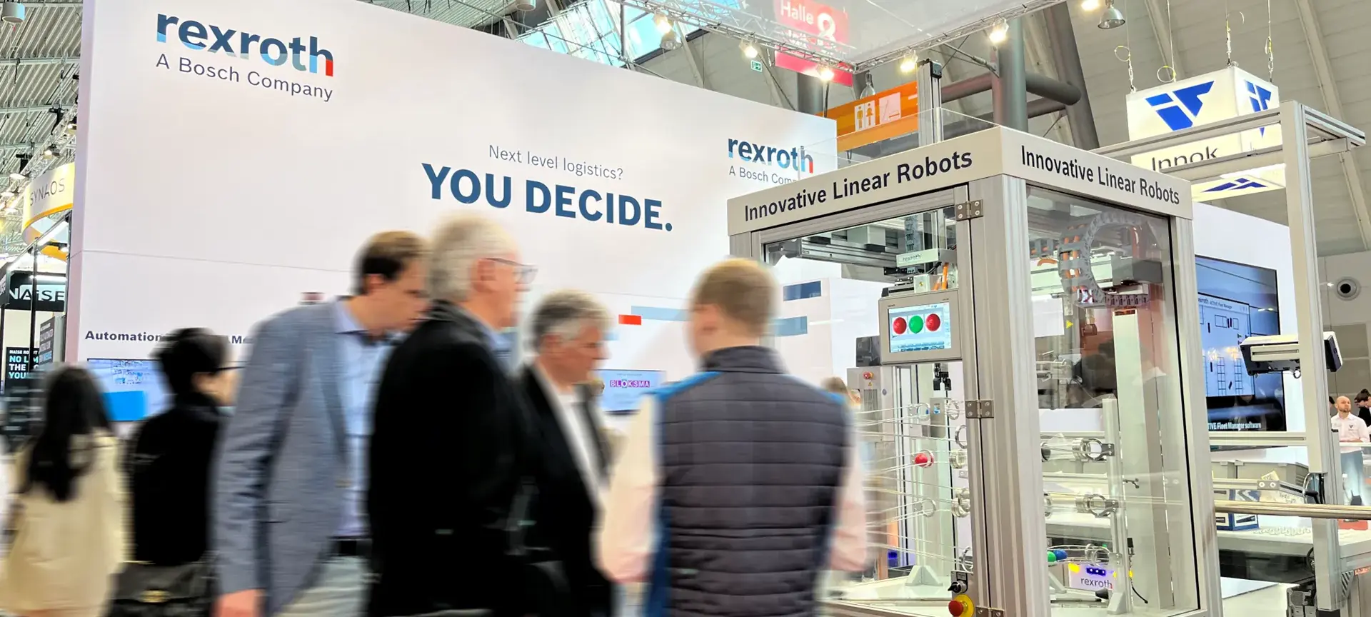 Bosch Rexroth booth with exhibits and visitor