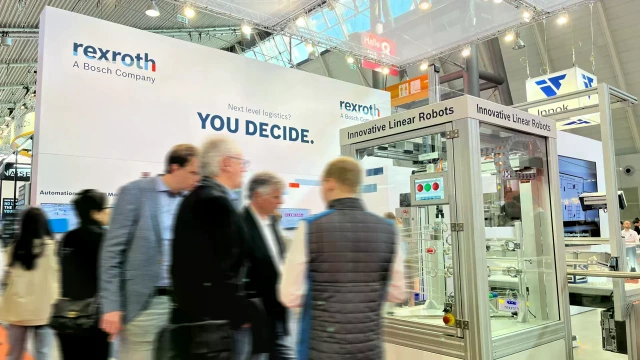 Bosch Rexroth booth with exhibits and visitor