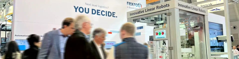 Bosch Rexroth booth with exhibits and visitor