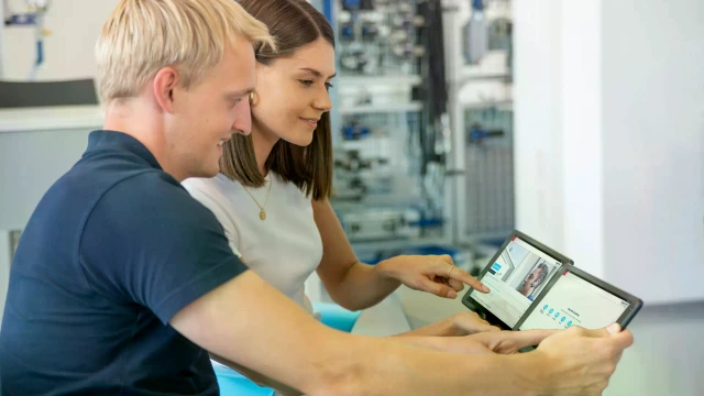 Training participants use their training tablets for teaching and learning materials. 